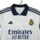 Jersey Real Madrid Dragon White Edition with intricate dragon artwork, inspired by the Real Madrid Kit with Dragon from 2014. High-quality fabric for comfort and durability.