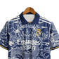 Jersey Real Madrid Dragon Blue Edition with intricate dragon artwork, inspired by the Real Madrid Kit with Dragon from 2014. High-quality fabric for comfort and durability.