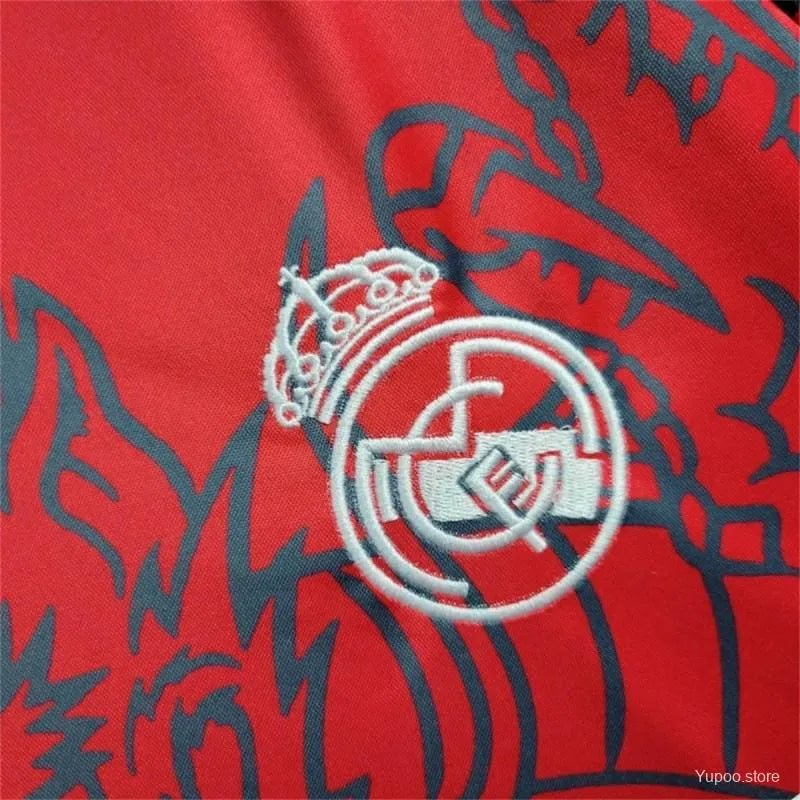 Real Madrid Red Dragon Jersey 2025 - Fan Version with an intricate Dragon Design Real Madrid Shirt, inspired by the 2014 edition.