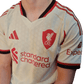 Fan wearing Liverpool Away Kit 2025/26 Wonder White contemporary style Goatkits Store