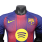 Barcelona jersey close-up showing unique gradient transition between red and blue stripes with purple haze effect and premium fc barcelona jersey fabric quality