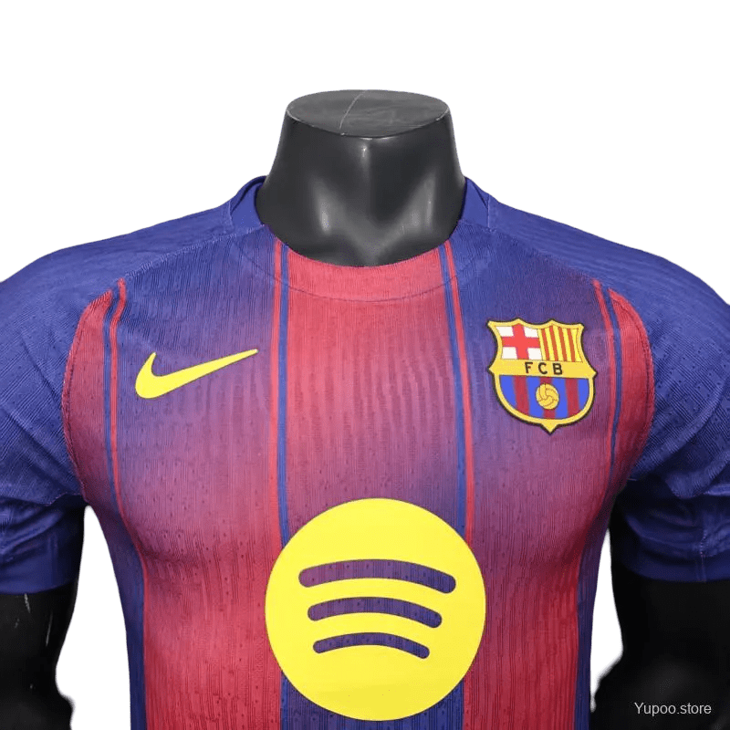 Barcelona jersey close-up showing unique gradient transition between red and blue stripes with purple haze effect and premium fc barcelona jersey fabric quality