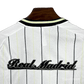 Real Madrid US Pack shirt front button closure detail displaying professional baseball style construction with authentic Real Madrid crest placement